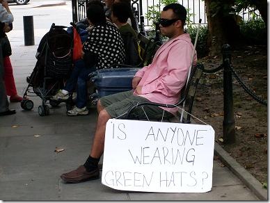 This man hates green hats.